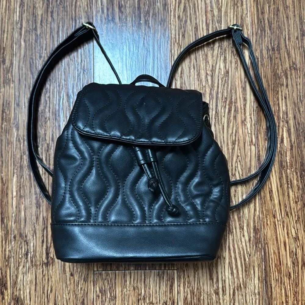 Alexis Bendel black quilted vegan leather adjustable backpack